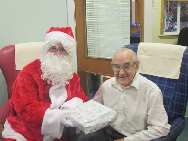 Santa giving present